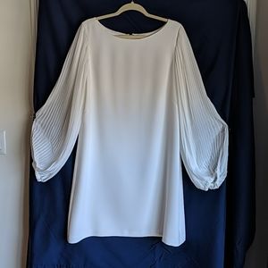 White flowy dress with sheer sleeves